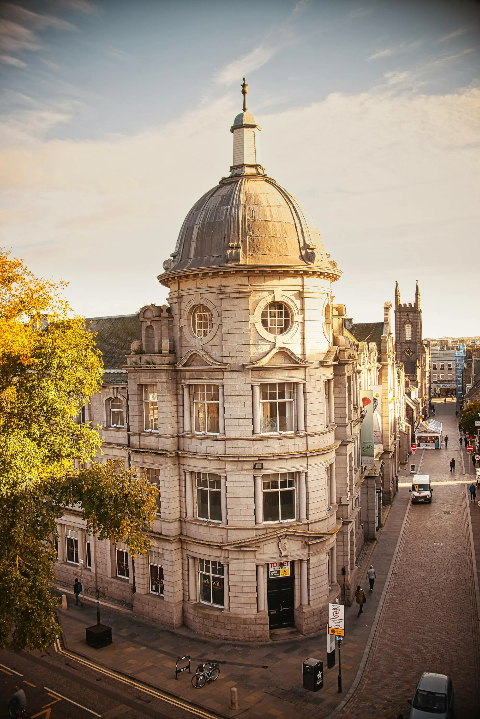 A granite street in Aberdeen city centre at golden hour