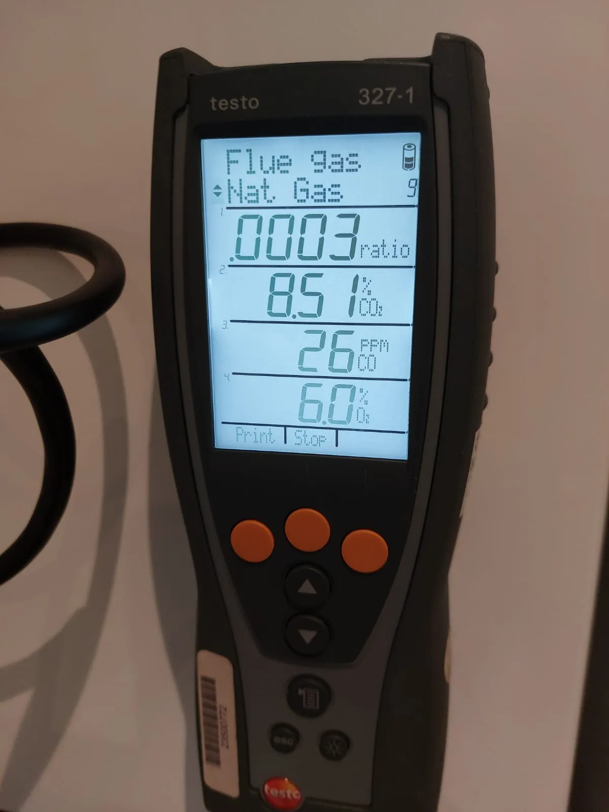 Belmont engineer running combustion analysis on a gas boiler during an Aberdeen annual service